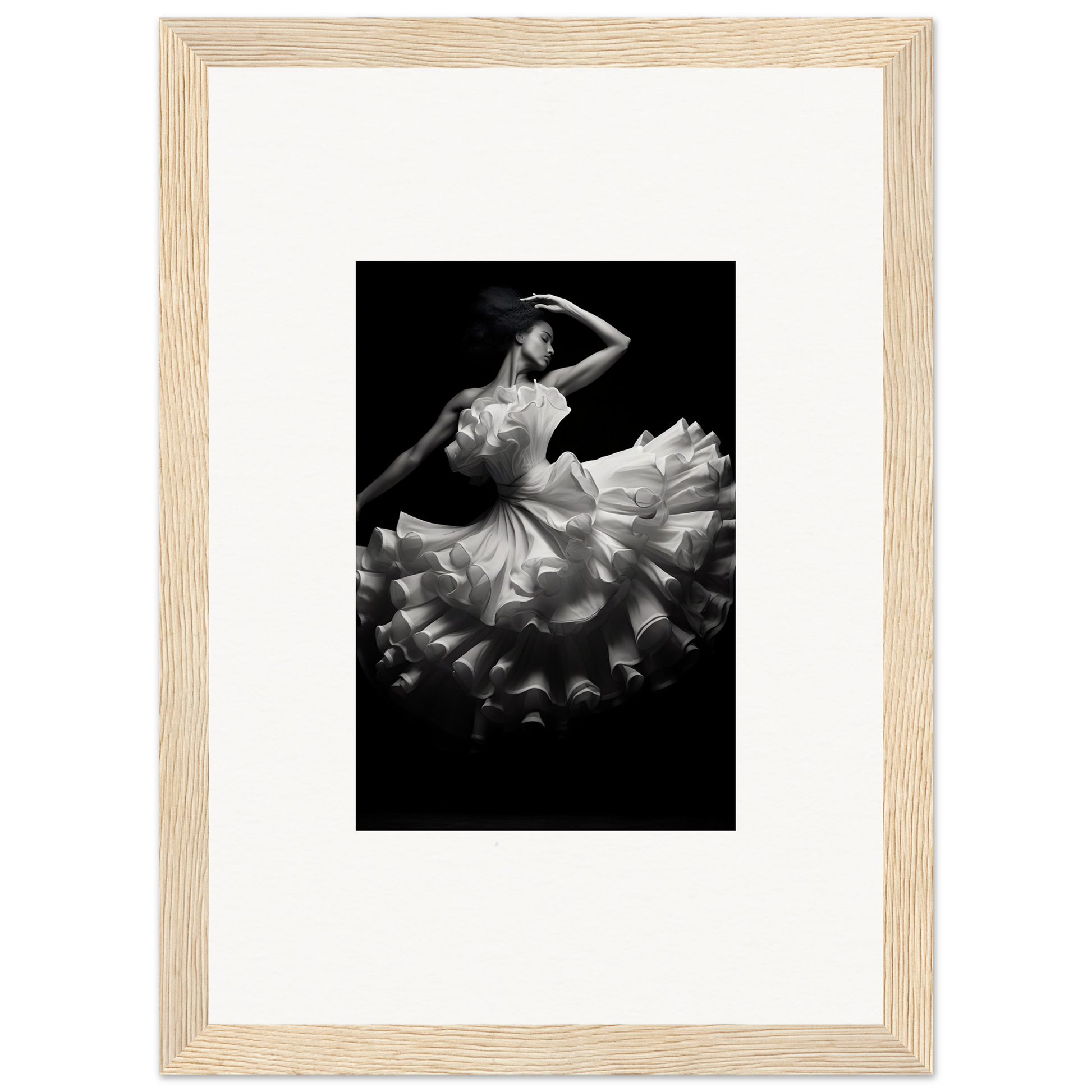 Black and white photograph of a ballet dancer in a flowing tutu dress.