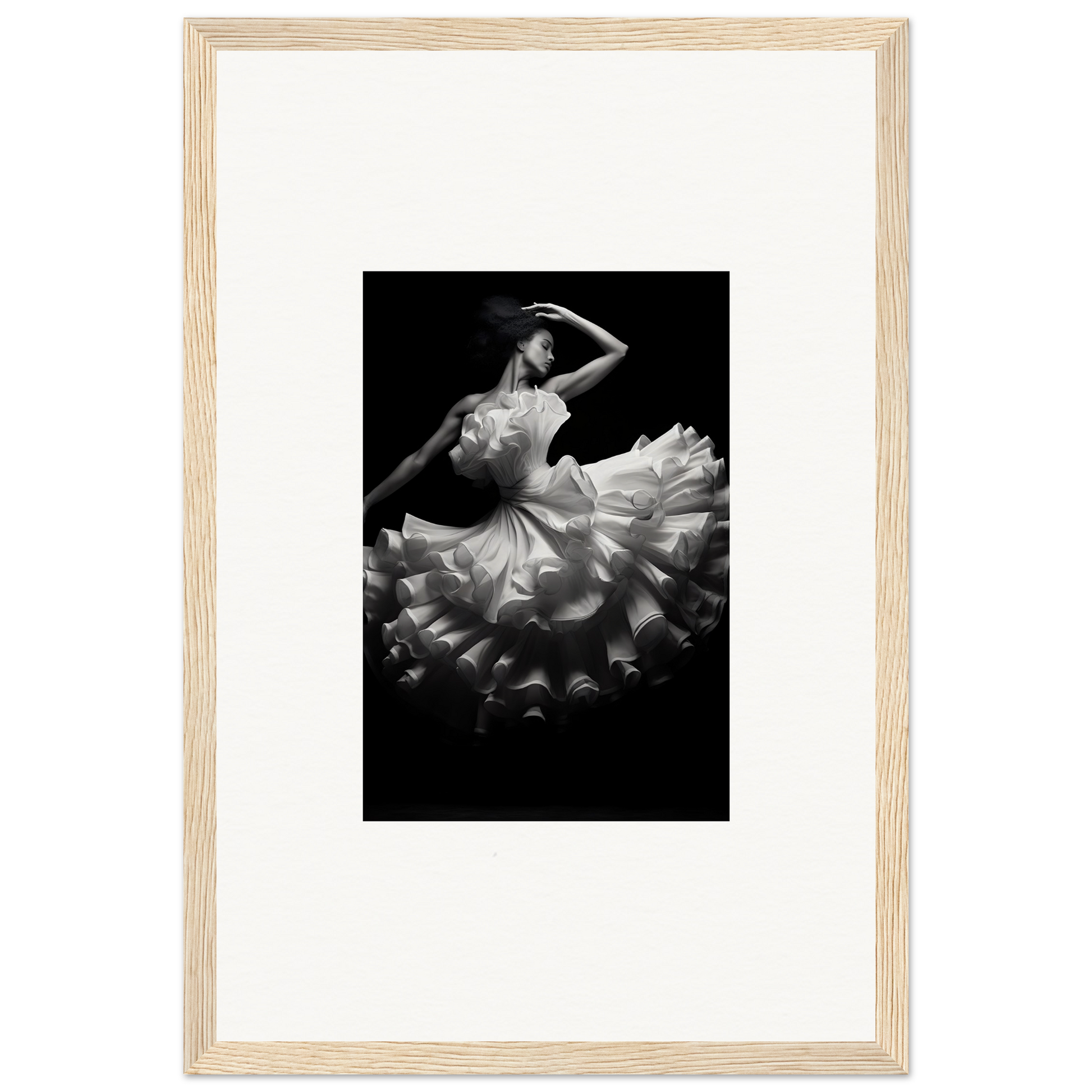 Black and white photograph of a ballet dancer in a flowing tutu dress.