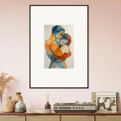 Abstract framed canvas print of a colorful figure embracing a child for room decoration