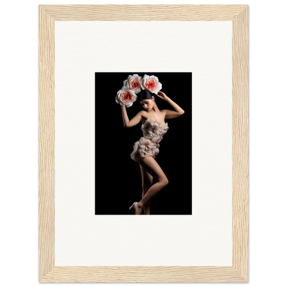 Framed wall art of a dancer in a feathered costume for floral heist room decor