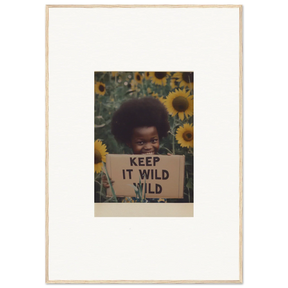 Framed photo of sunflowers with a KEEP IT WILD sign from Euphoric Sun Voyages