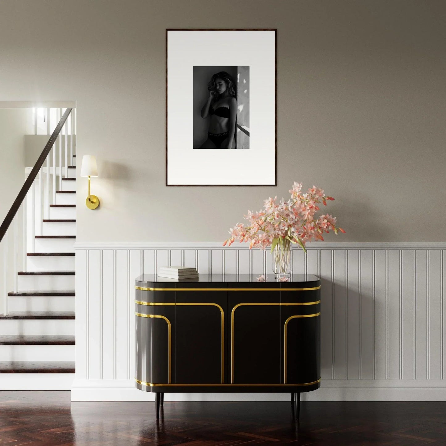 Elegant black sideboard with gold trim and curved edges.