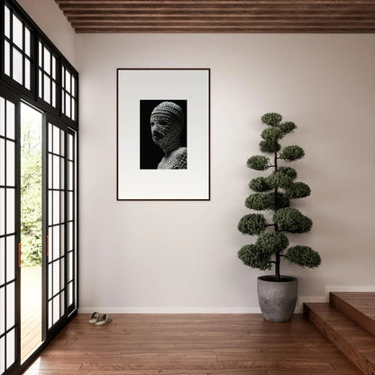 Framed black and white photograph of a sculptural bust.