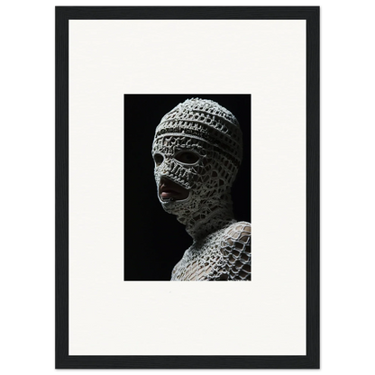 Sculpture of a head wrapped in bandages or textured material.