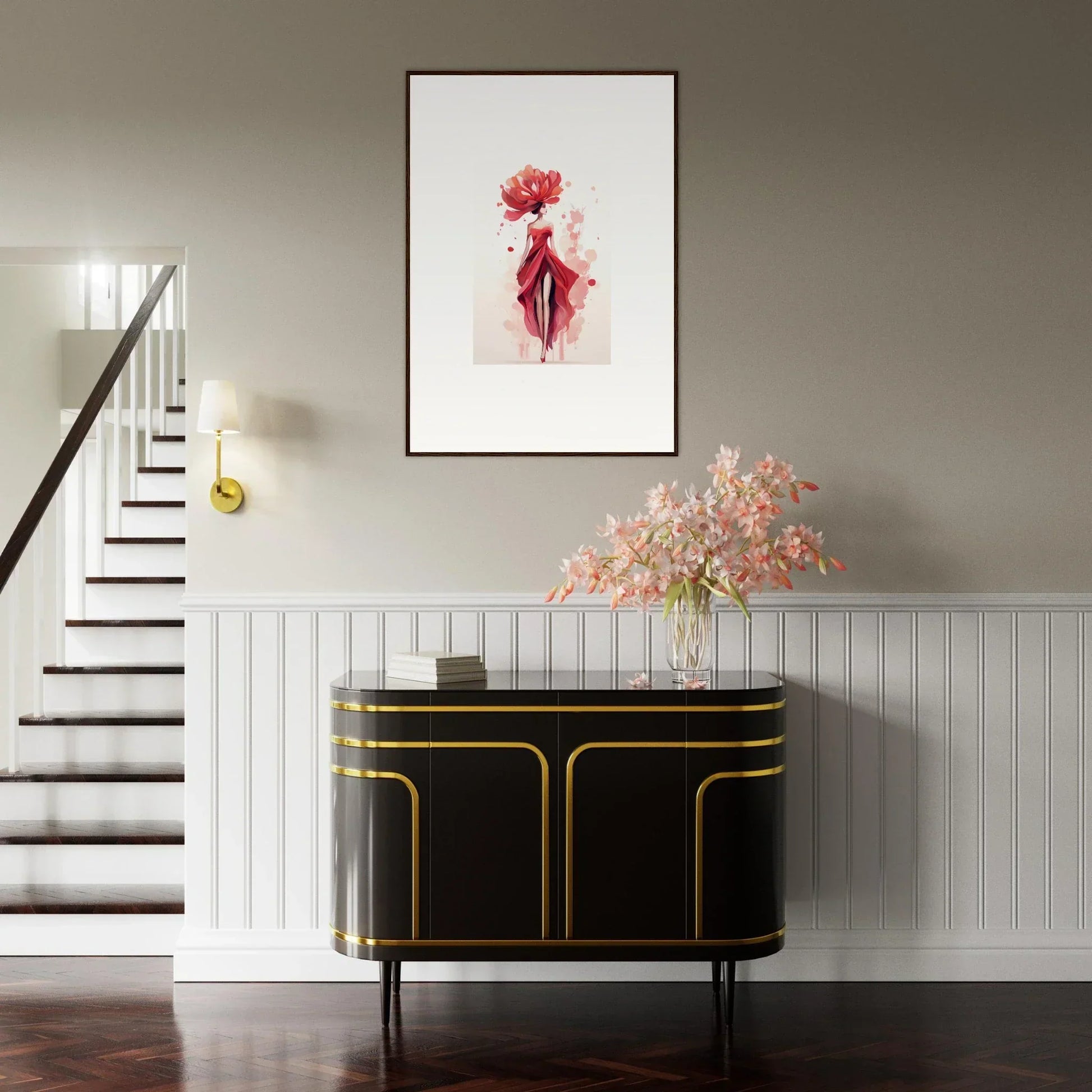 Elegant entryway with black and gold console table, floral arrangement, and framed wall art