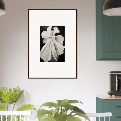 Framed black and white photograph of a woman in a white dress for elegant room decor