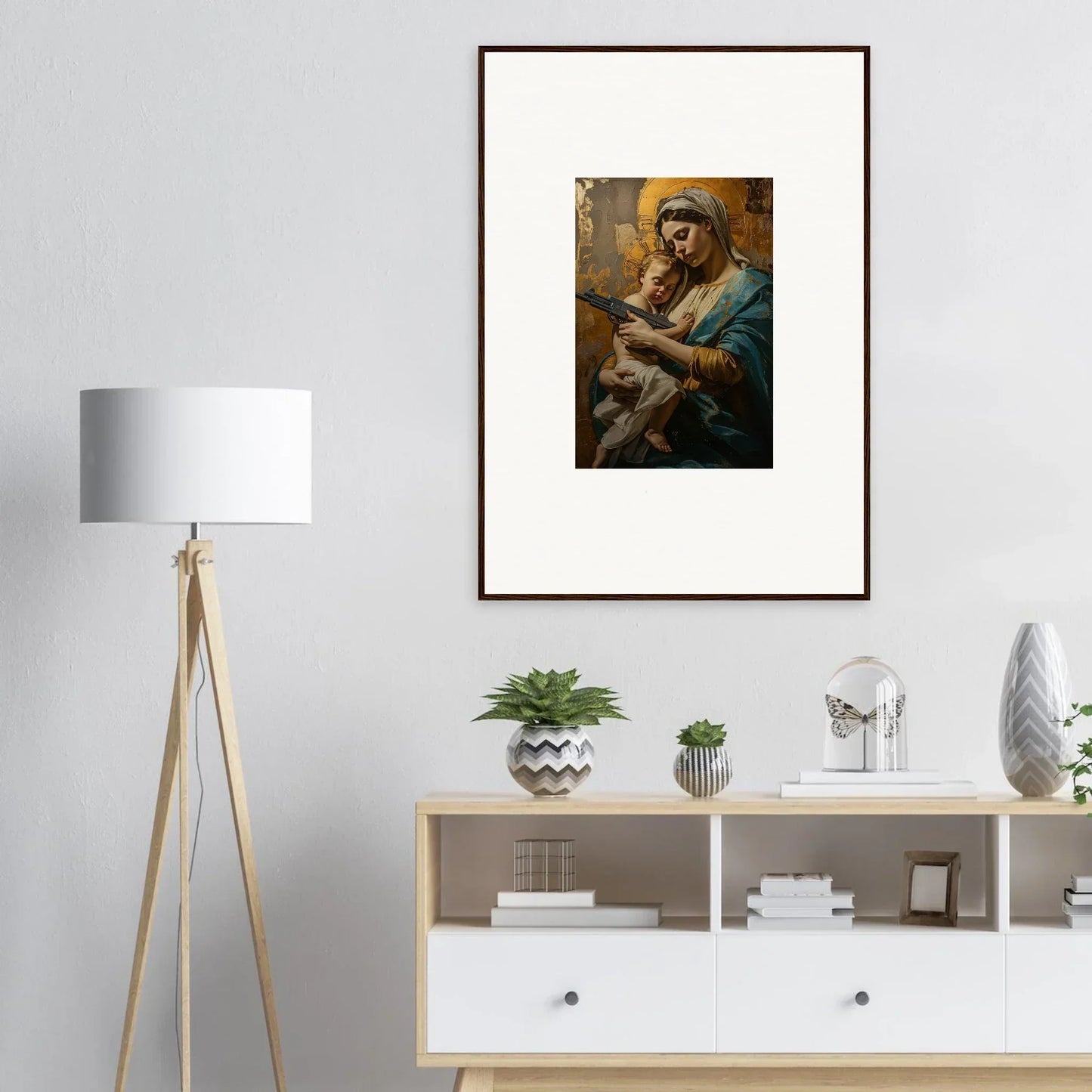 Framed wall art of a woman in blue with baby, perfect for serene room decor