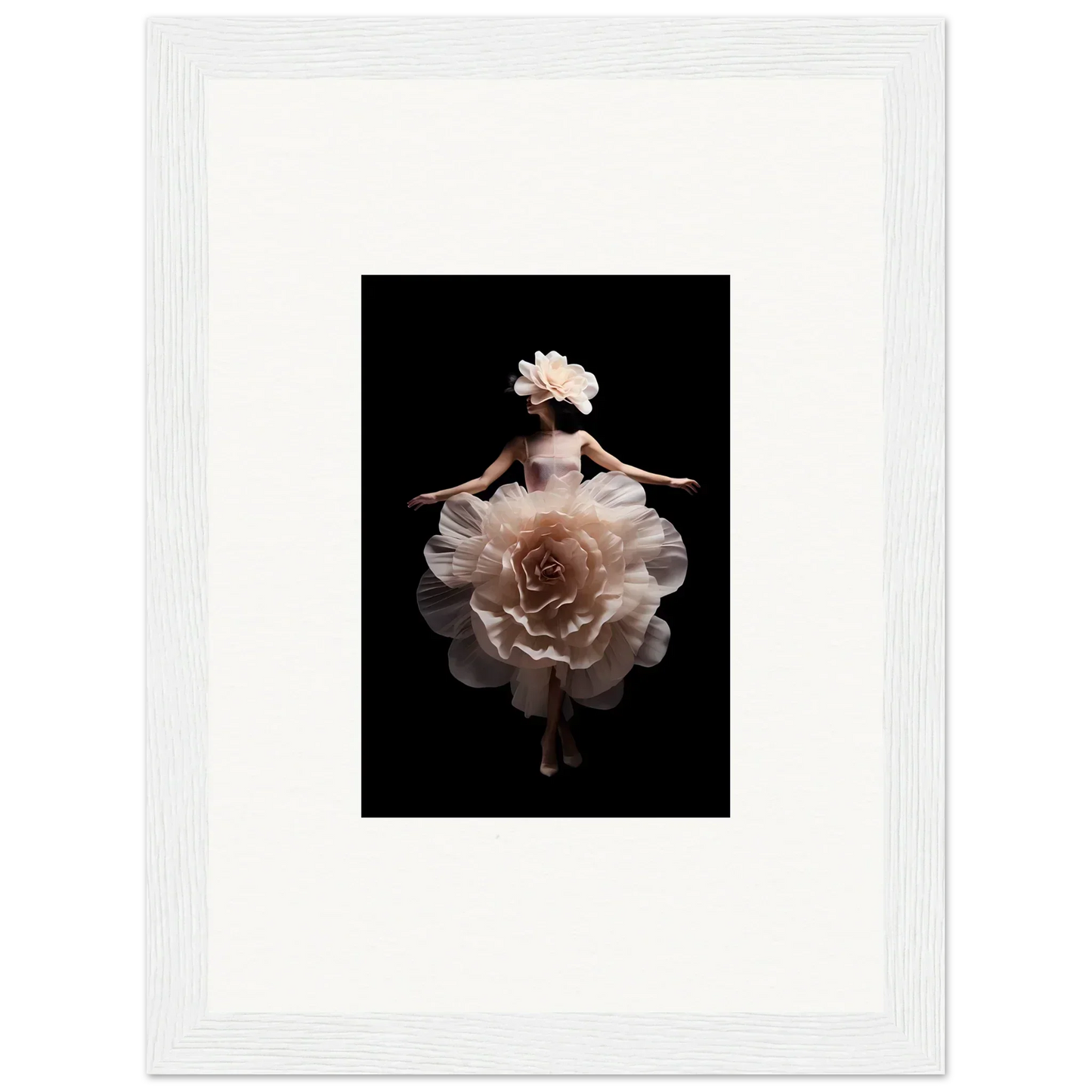 Ballerina figure formed by a delicate pink flower in full bloom.