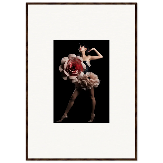 Dancer wearing a dress resembling giant pink roses against a dark background.