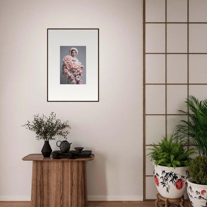 Framed wall art of a person holding pink flowers in a Chrysanthemum Daydream design