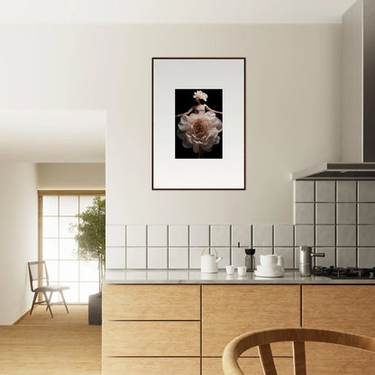 Framed photograph of a bird’s nest with eggs hanging on a kitchen wall.