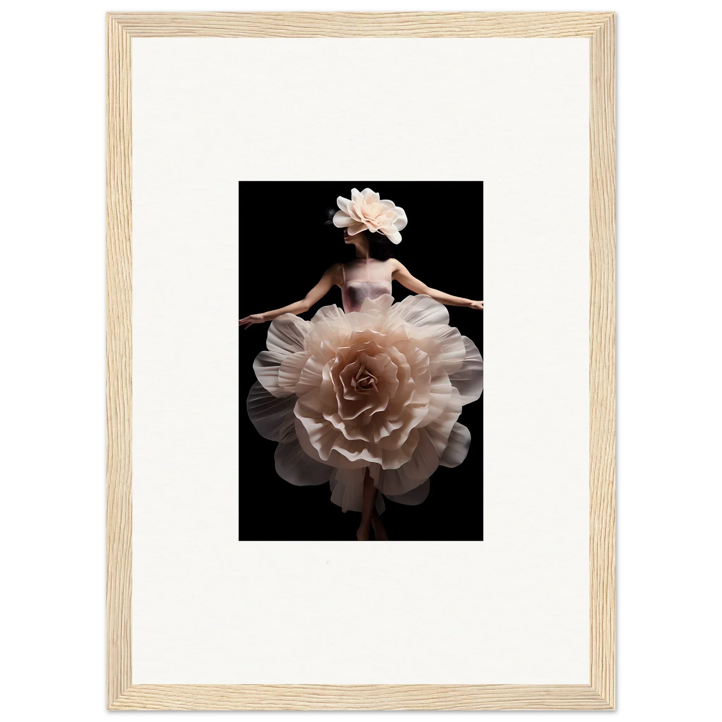 Framed artistic photograph of a figure wearing a dress resembling a blossoming rose.