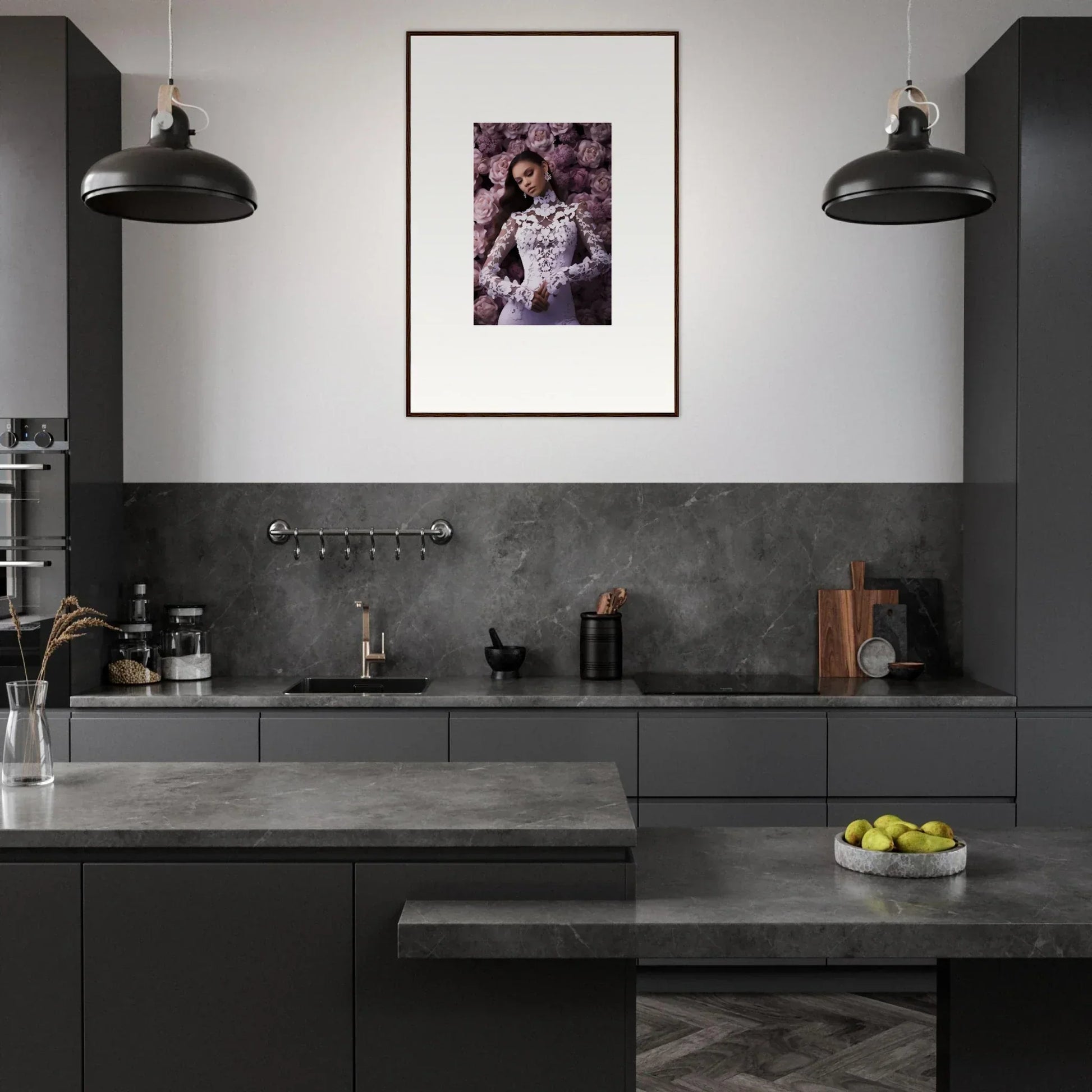 Modern kitchen with dark cabinetry, concrete countertops, and framed wall art memory mosaic