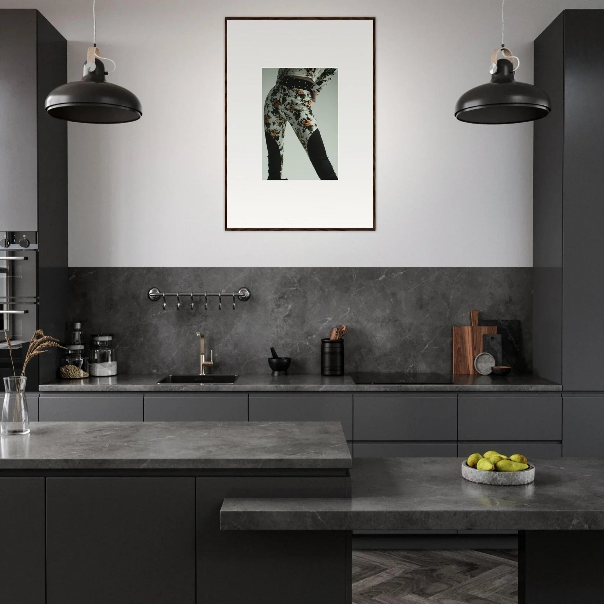 Modern, sleek kitchen with dark cabinetry and a monochrome color scheme.