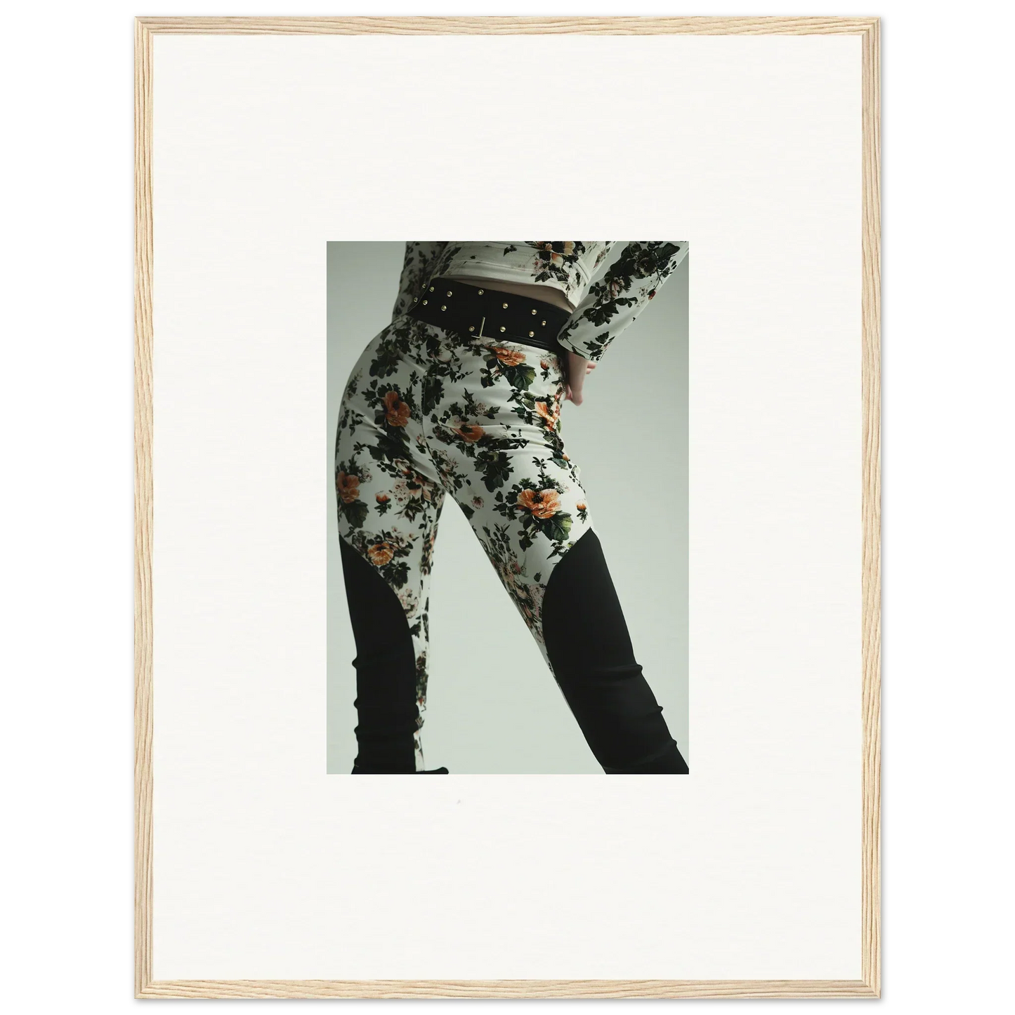 Pair of patterned leggings or tight pants with a floral design.