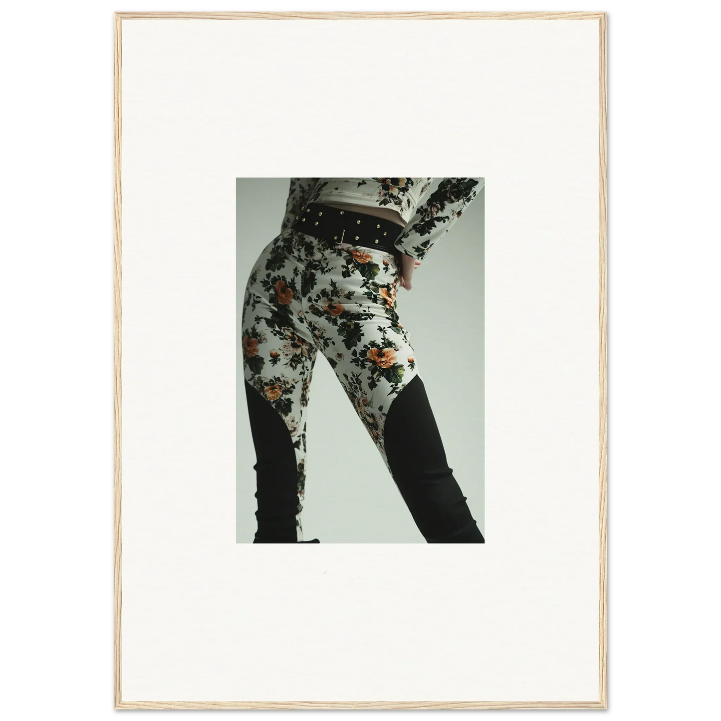 Pair of patterned leggings or tight pants with a floral design.