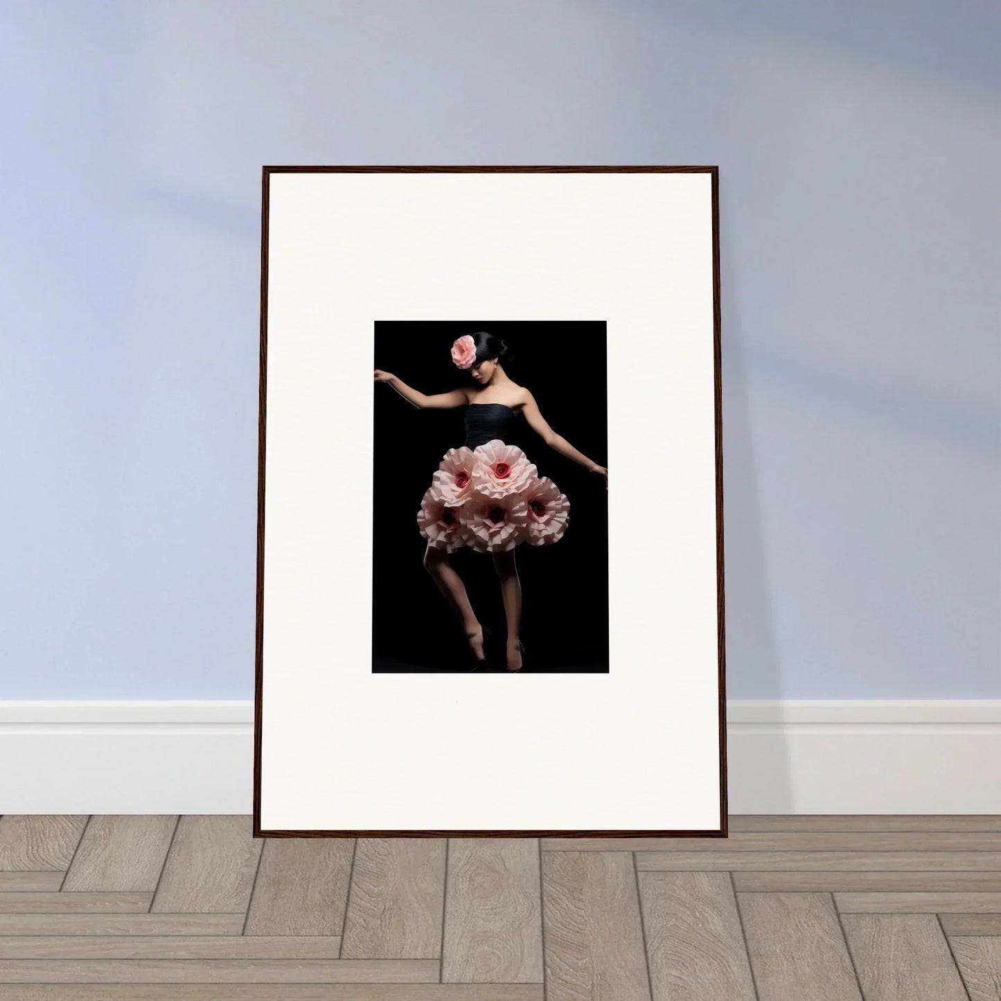 Framed wall art of a dancer in a pink floral tutu for elegant room decor