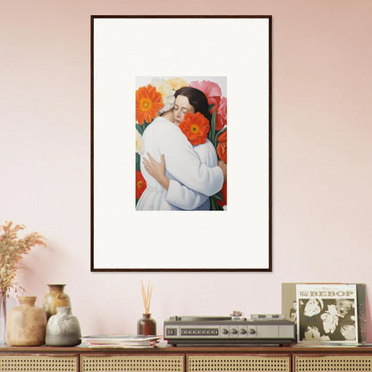 Framed Floral Synapse artwork of two people embracing with orange flowers background