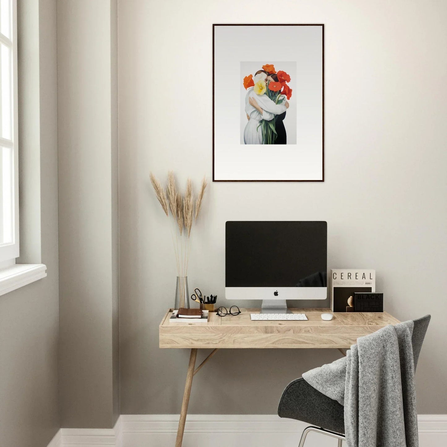 Minimalist home office with wooden desk, computer, and Floral Vortex Embrace canvas print