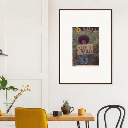 Framed canvas print of a person with a KEEP IT WILD sign for room decoration