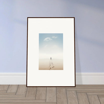 Framed wall art of a solitary figure on a beach, capturing entwined nostalgia