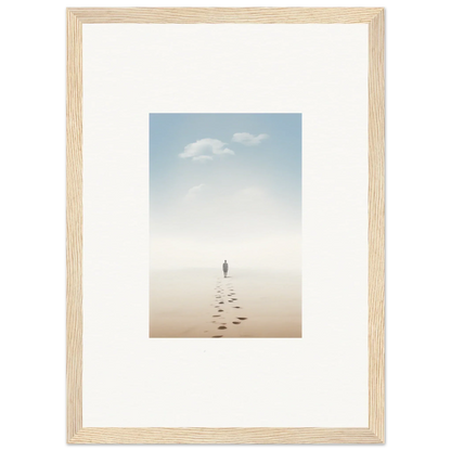 Framed wall art of a solitary figure on a misty beach evokes entwined nostalgia