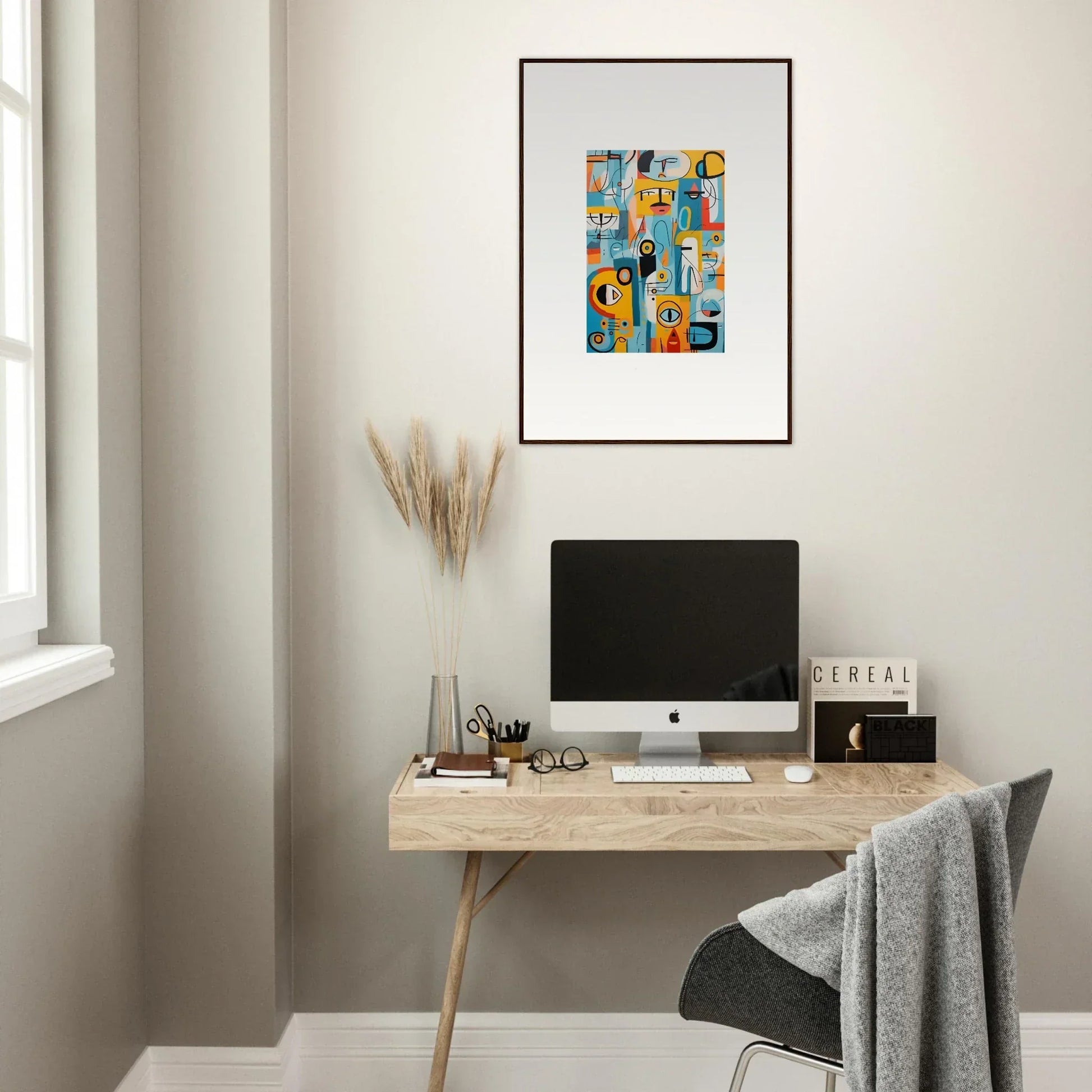 Minimalist wooden desk featuring iMac and premium framed wall art from Fragment Streams Tango