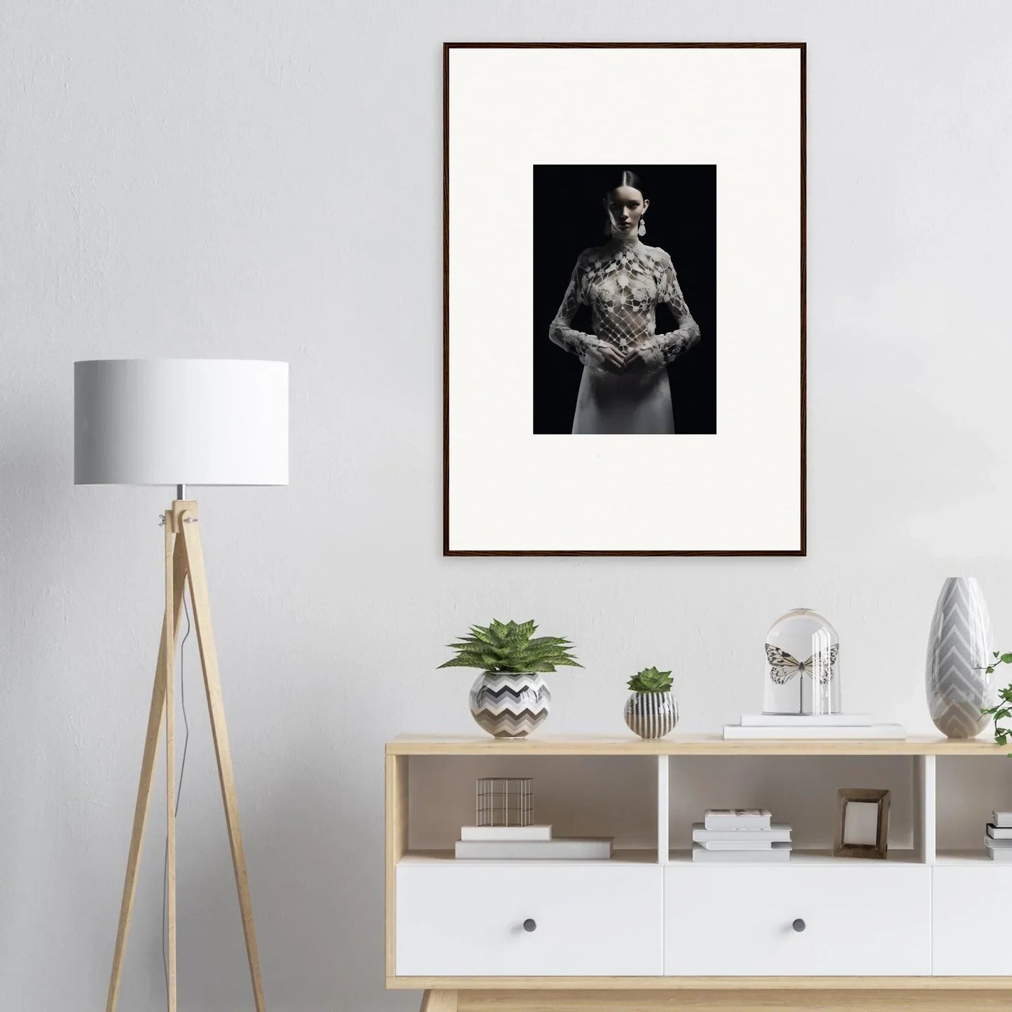 Framed black and white portrait tattoo art, perfect for Etheris Dress room decor