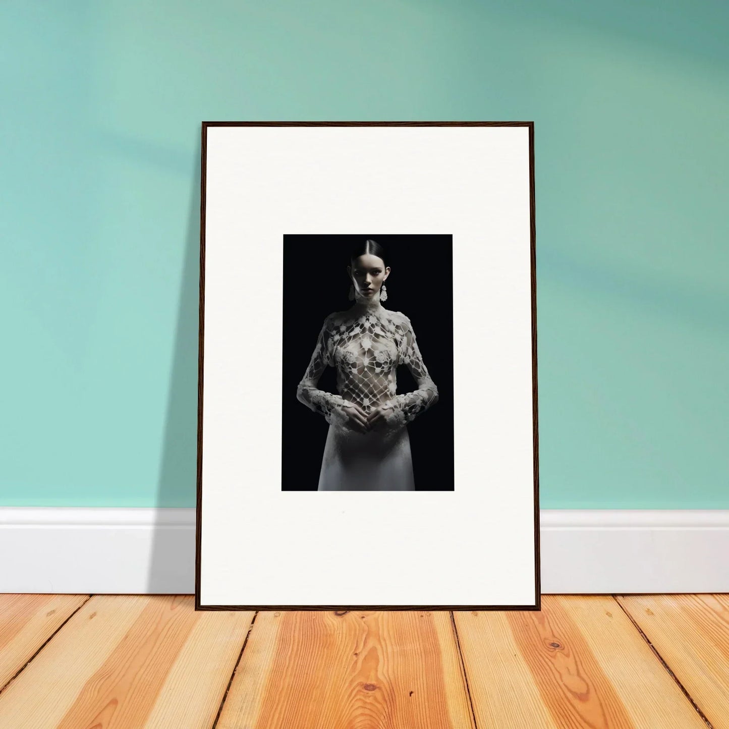 Framed black and white wall art of a person in a floral Etheris Dress for room decor