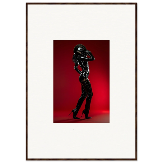 Silhouette of a person in a shiny black outfit striking a dynamic pose.