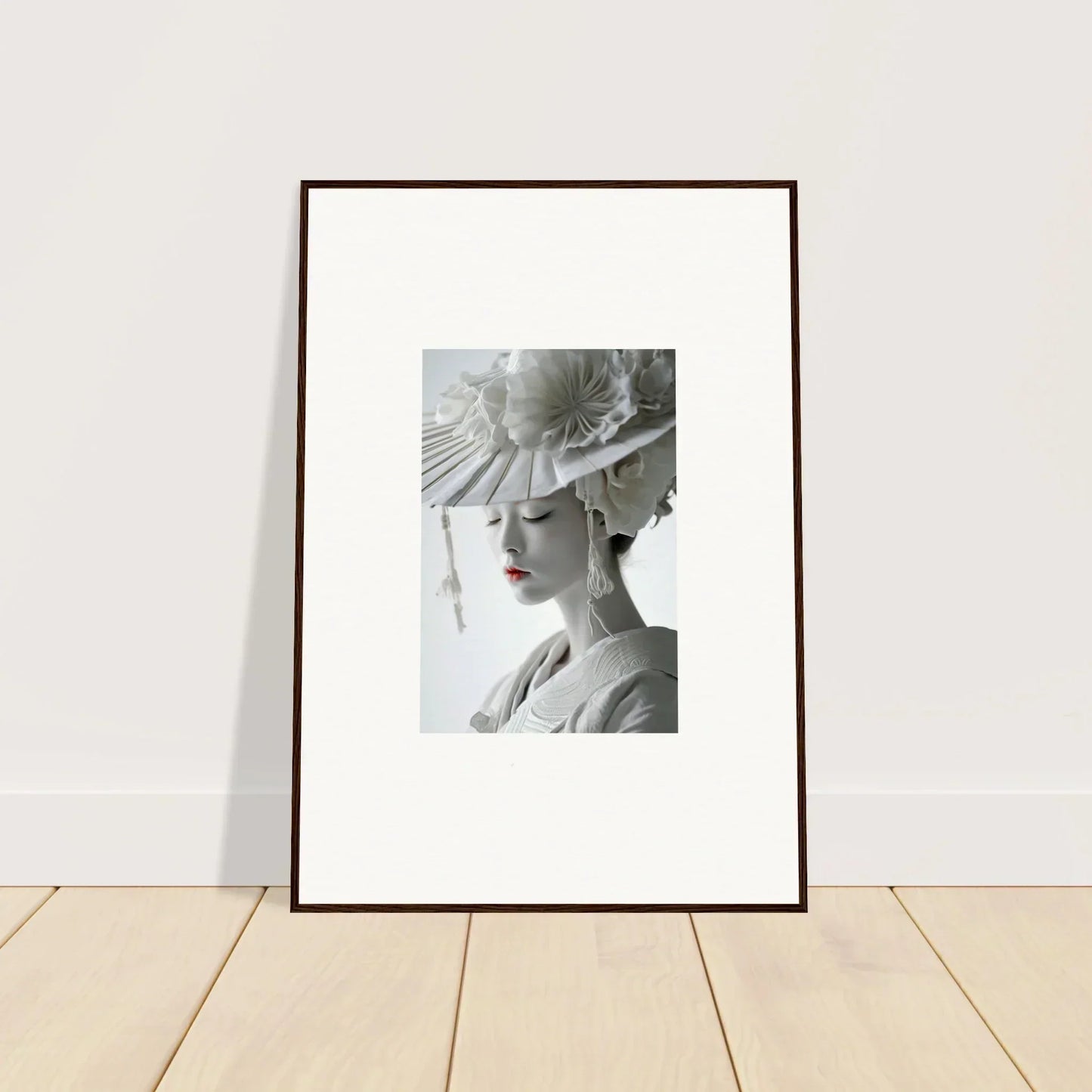 Framed black and white photo of a woman in an ornate hat for stylish room decoration