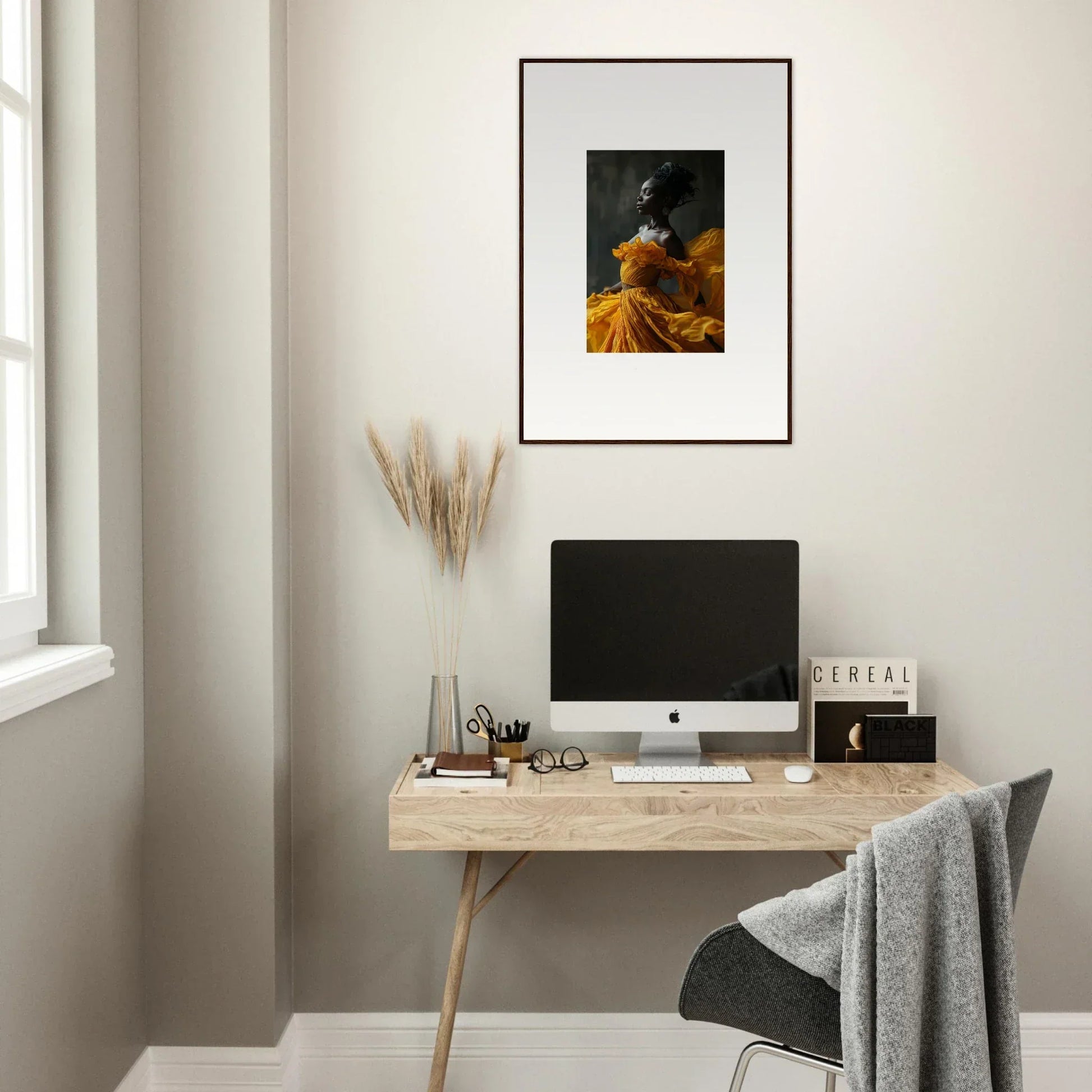 Minimalist home office with wooden desk, computer, and Silence Rapture framed wall art