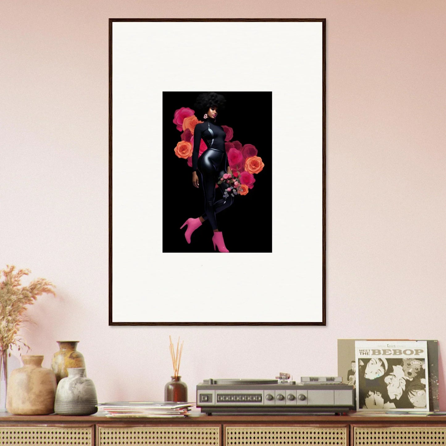 Framed wall art of a stylized figure with vibrant red flowers, perfect for room decor