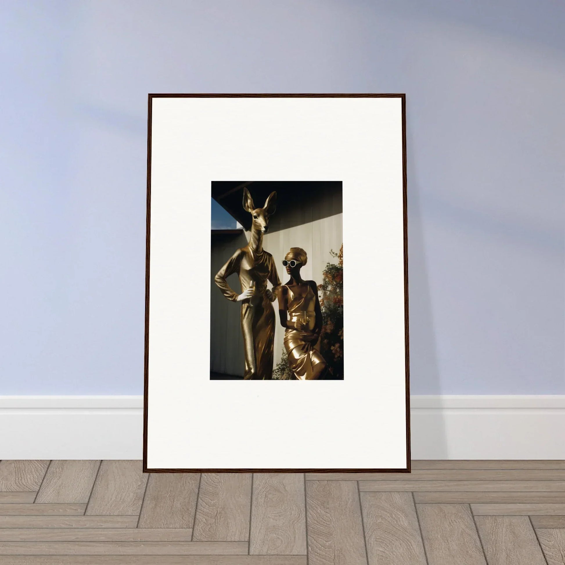 Framed photograph of ancient Egyptian statues or sculptures.