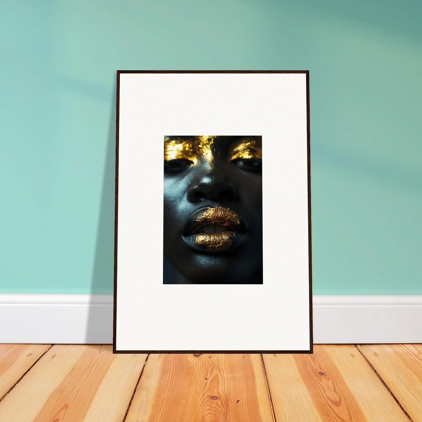 Framed canvas print of a face with gold lips, perfect for Star Riot room decoration