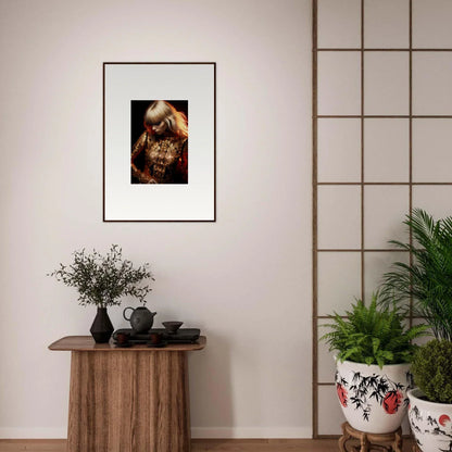 Framed portrait photograph of a person with long hair holding a golden object.