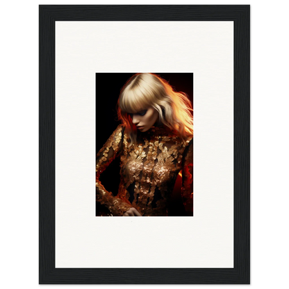 Framed portrait photograph of a blonde woman wearing a glittering gold outfit.