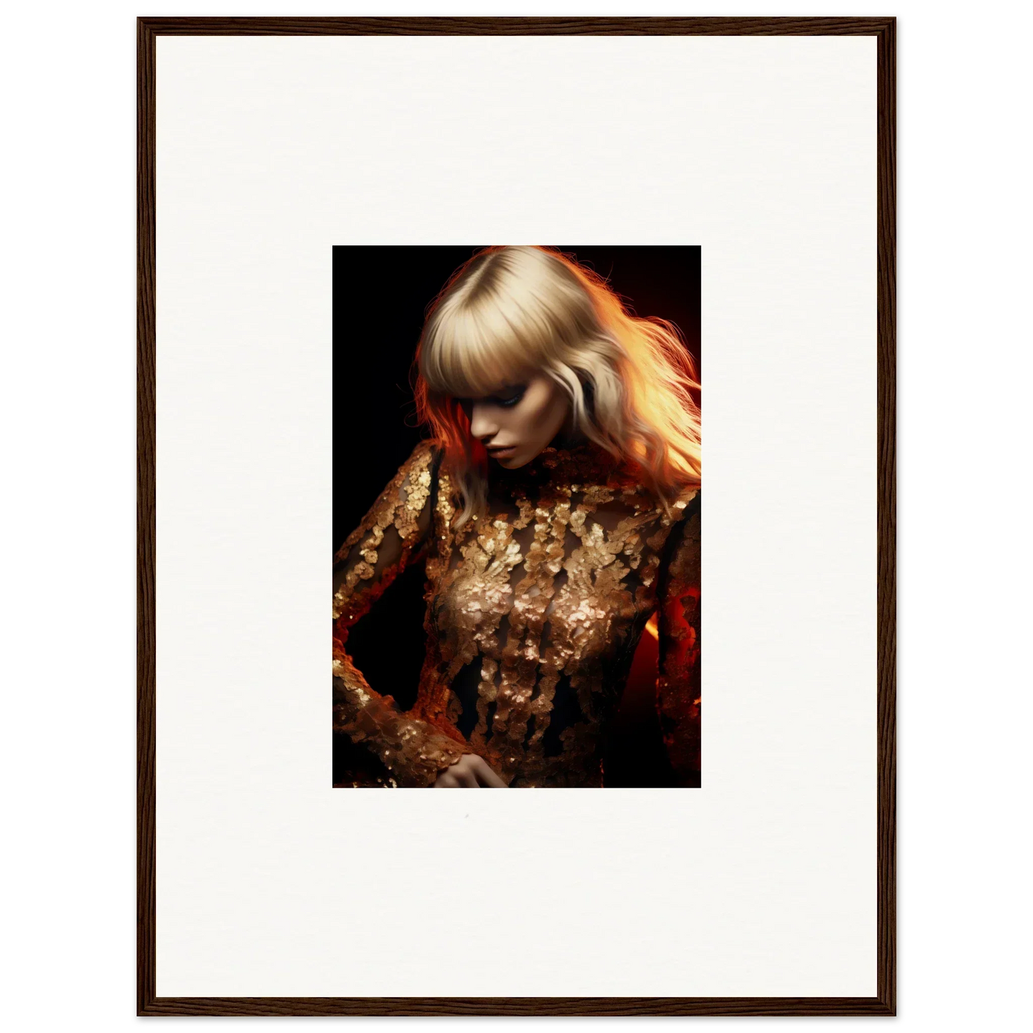 Framed portrait photograph of a woman with blonde hair wearing a shimmering gold outfit.