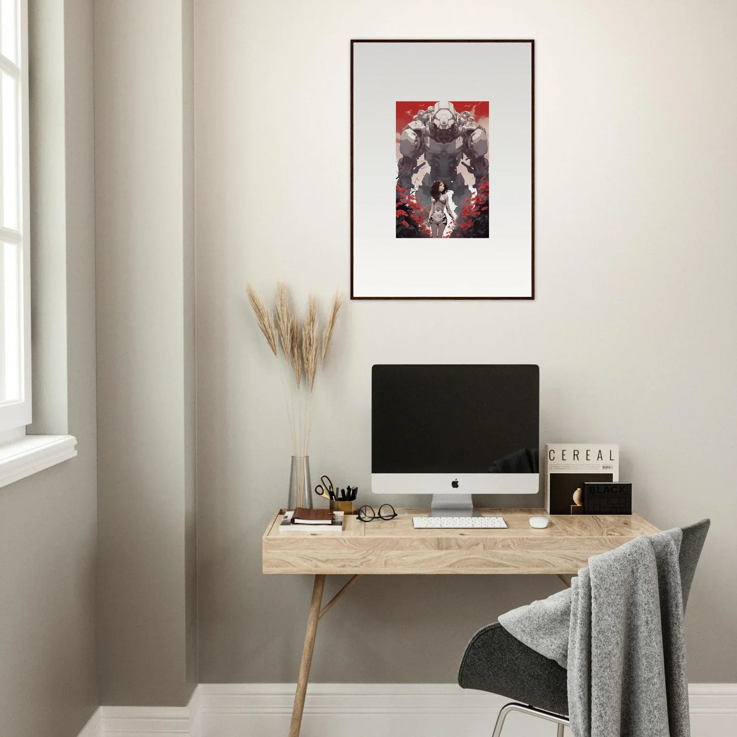 Minimalist home office with wooden desk, computer, and framed wall art for decor