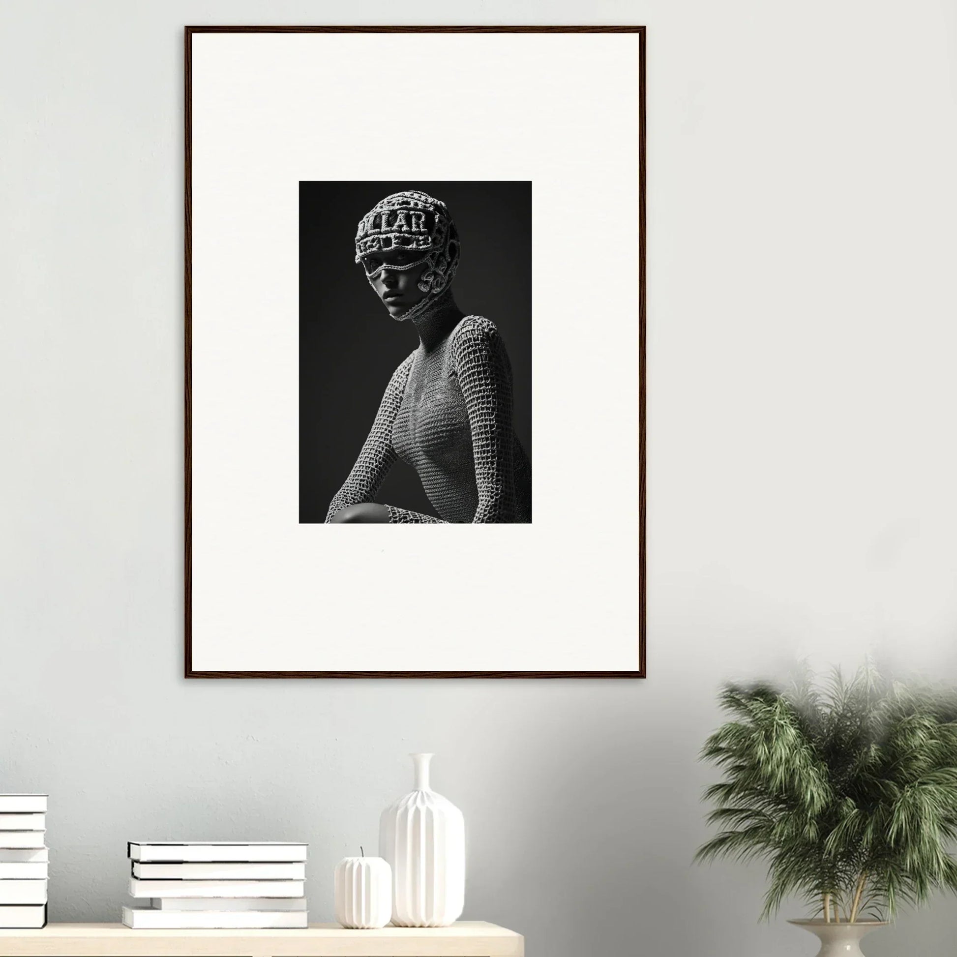 Framed black and white photograph of a bust with phrenology markings.