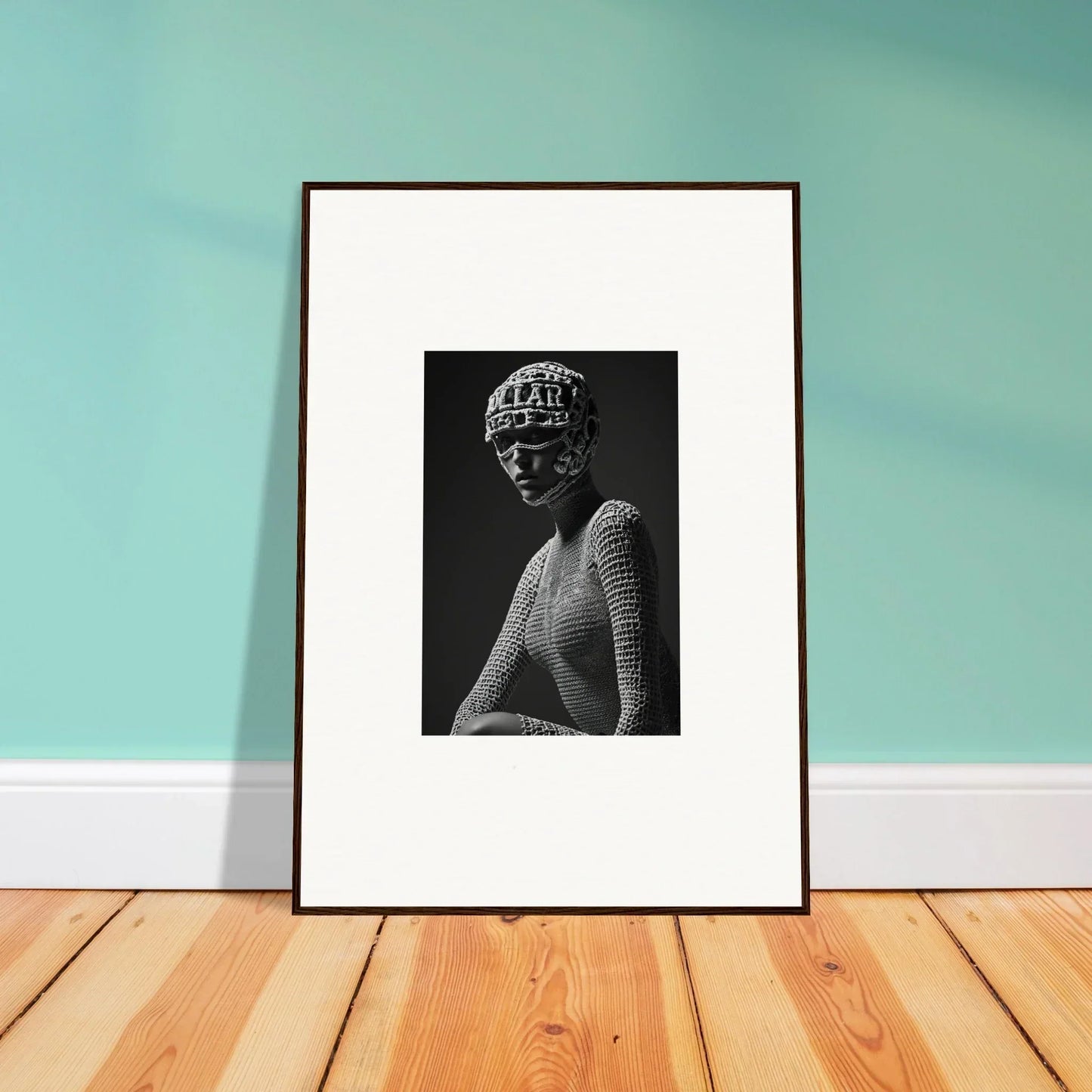 Framed black and white artwork depicting a bust with phrenology markings.