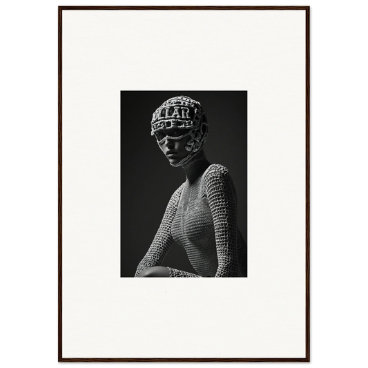 Black and white photograph of a figure wearing a patterned headpiece and textured top.