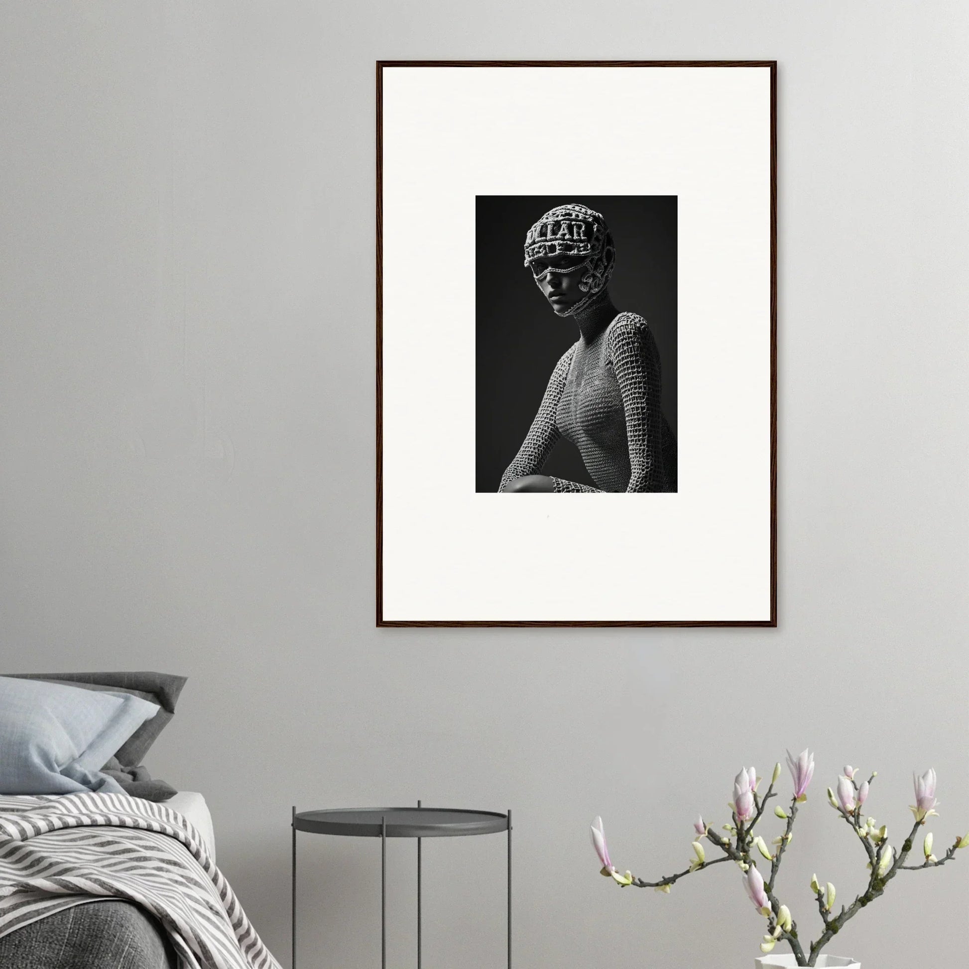 Framed black and white photograph of a classical-style bust sculpture.