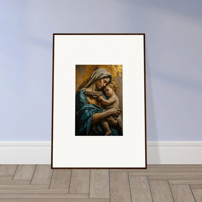 Framed wall art of Saints Harmony with a woman in blue robes holding a child