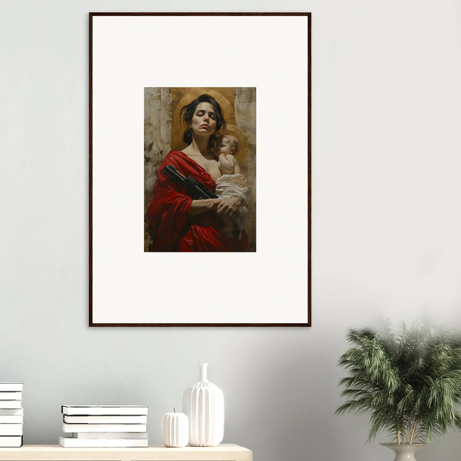 Framed wall art of a woman in red holding a baby for elegant room decor