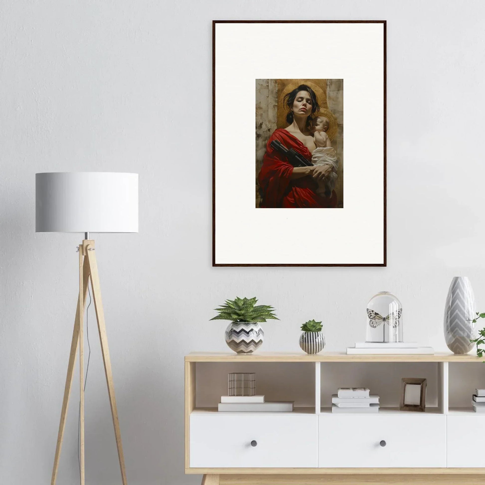 Framed wall art of a woman in a red dress holding a child, ideal for room decor