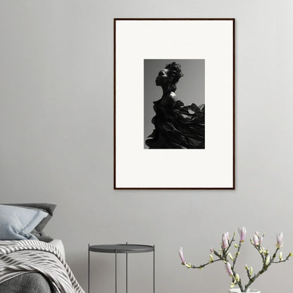 Framed black and white wall art of a silhouetted figure embodies tranquil eternity, perfect for room decor