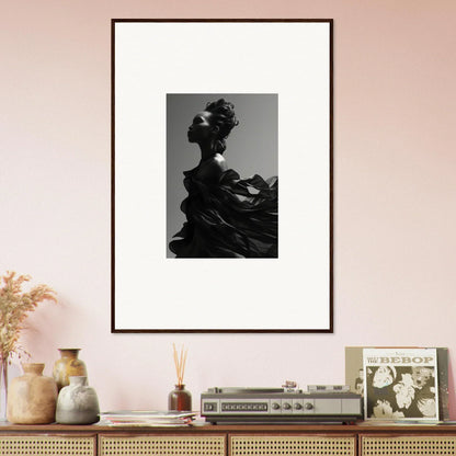 Framed black and white wall art of a silhouetted figure for tranquil eternity room decor