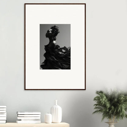 Framed black and white wall art of a silhouetted figure for tranquil eternity room decor