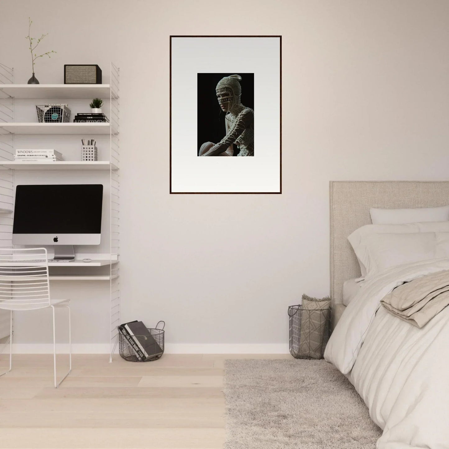 Minimalist bedroom interior with white walls and modern furnishings.